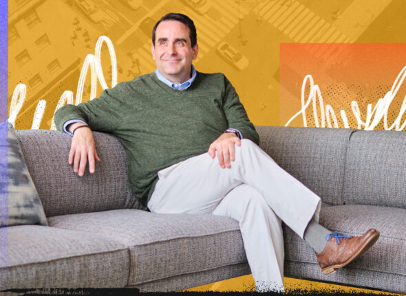 John Brothers on couch with colorful graphic background